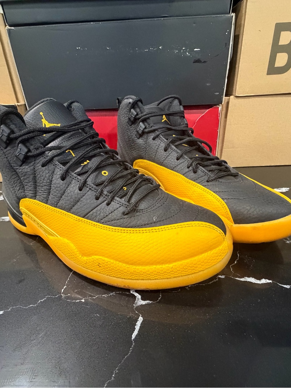 Jordan 12’s Men’s Basketball Sneakers in Black and Yellow